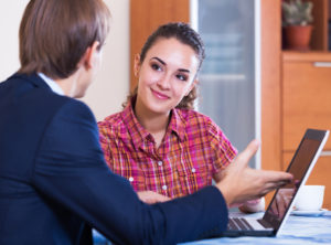Man interviewing woman for job