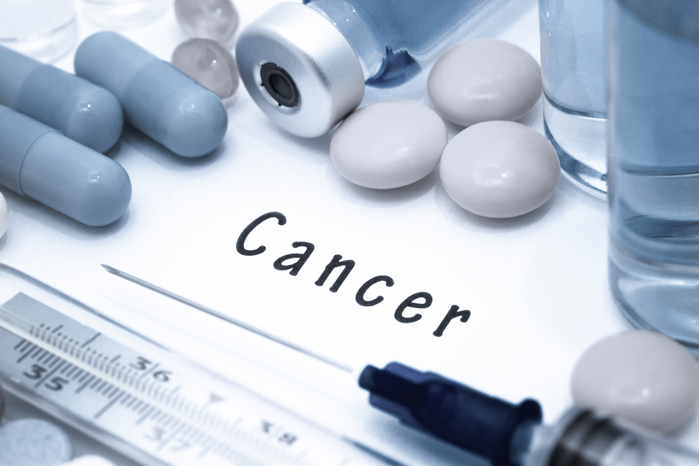 Photo of cancer word with medicine