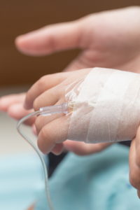 Child's hand with IV in it