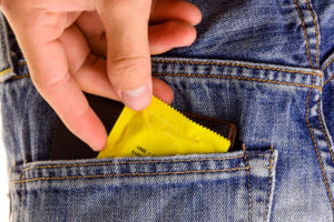 Photo of condom in pocket