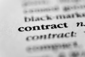 Contract typed out on a piece of paper