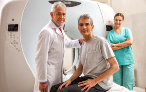 Doctor and patient on an MRI machine