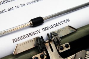 Emergency Information being typed out on the typewriter