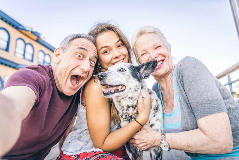 selfie of family with dog