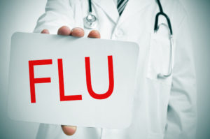 photo of doctor with flu sign