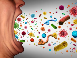 Germs coming from mouth of person