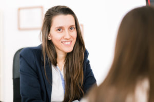 Girl smiling with counselor