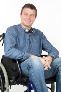 Photo of man in wheelchair