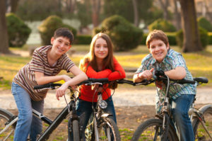 Kids riding bikes outside
