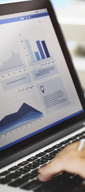 laptop screen with graphs
