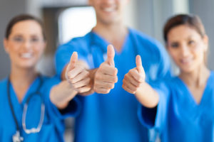 nurses with thumbs up