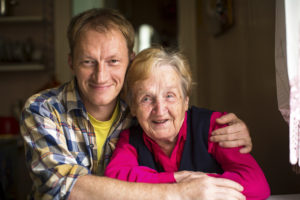 Photo of older woman and son