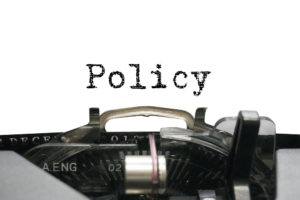 Policy typed out with a typewriter