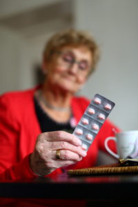 Woman holding a blister pack
