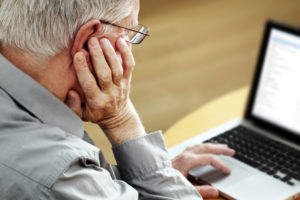 PHoto of senior with computer