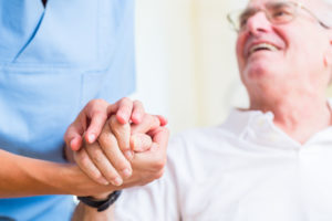 Photo of senior with aide