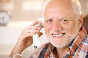 senior man with phone