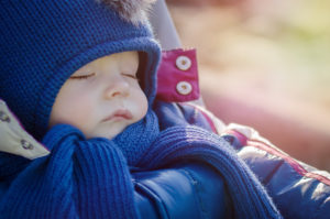 Baby sleeping in a stroller