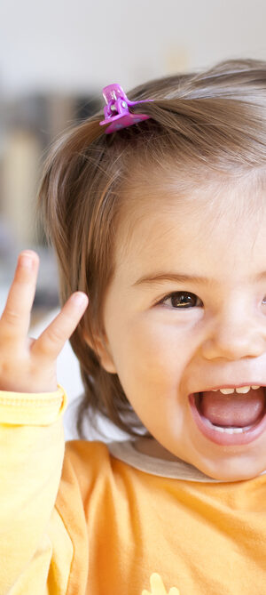 toddlersmilingwithhands