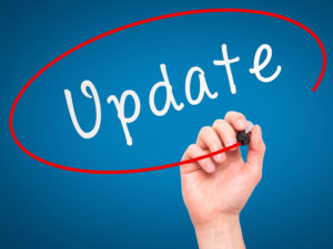 The word update written on a blue screen