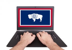 photo of Wyoming flag screen on a laptop