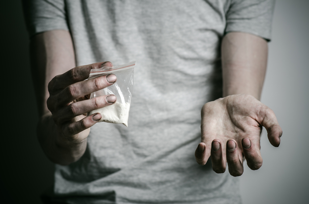 photo of drugs and hands