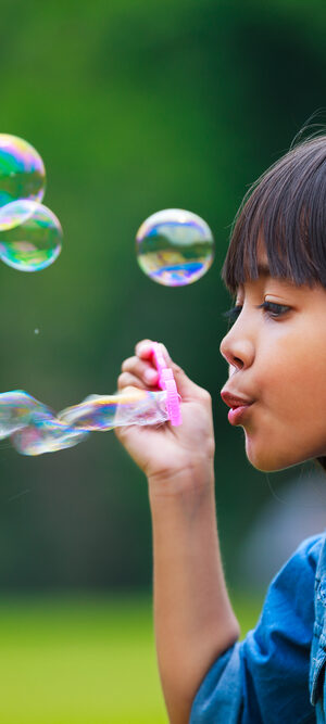 girlblowingbubbles