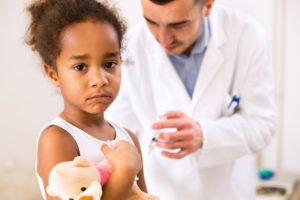 Photo of girl getting vaccine