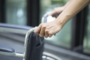 hands on wheelchair