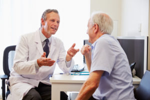senior with doctor