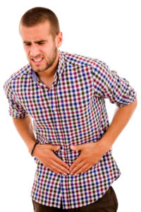 sick guy holding stomach