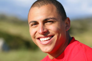 Photo of smiling guy outdoors