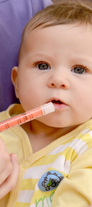 baby getting medicine