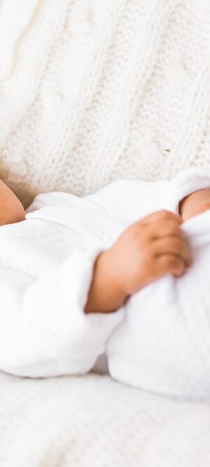baby on white blanket
