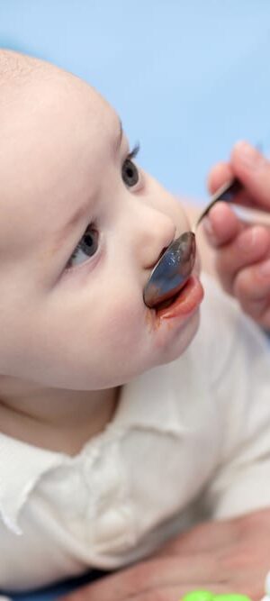 baby taking medicine