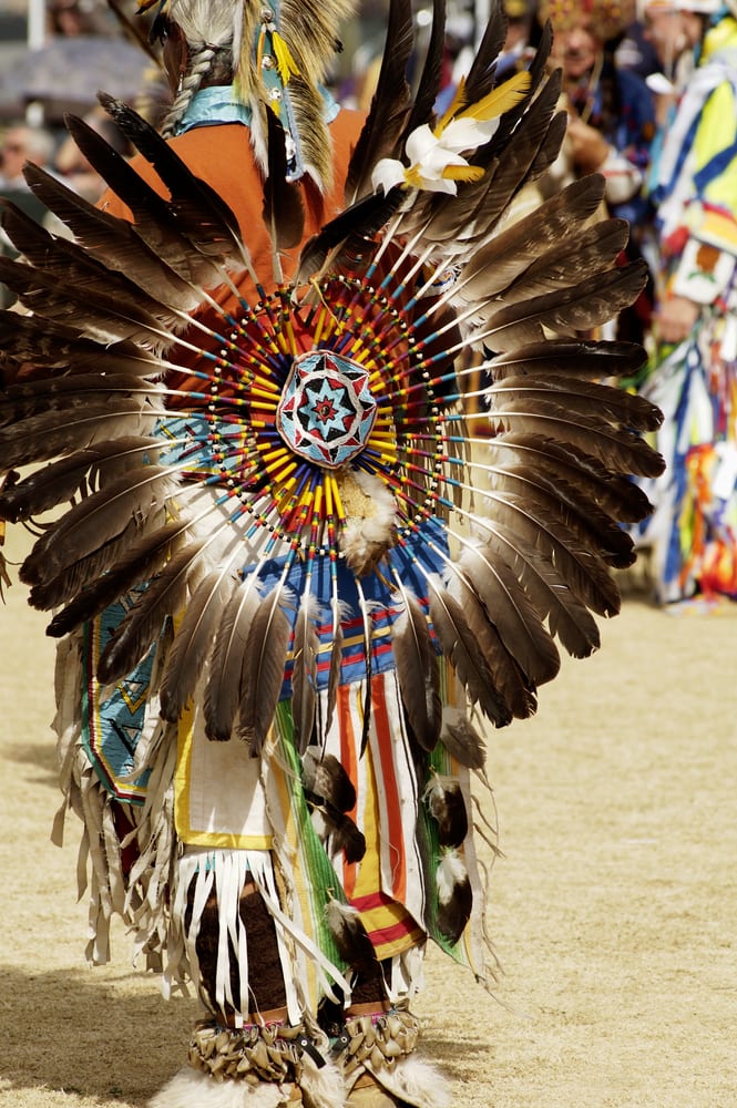 back view with indian dancing - Wyoming Department of Health