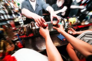 hands at a bar