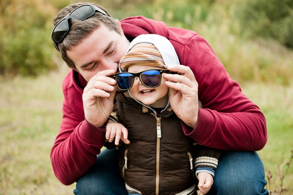 boy and dad with sunglasses - Wyoming Department of Health