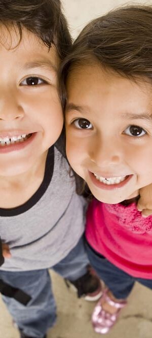 boy and girl with backpacks