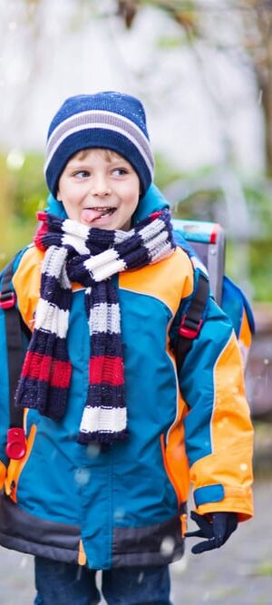 boy eating snowflakes