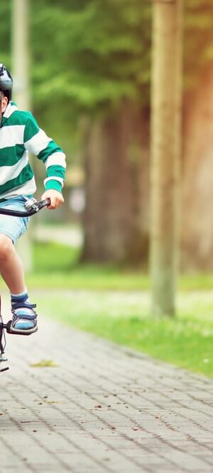 boy on bike in town