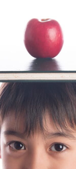 boy with apple and book