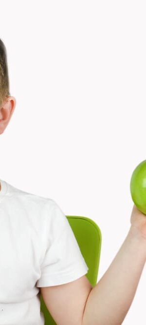 boy with green apple