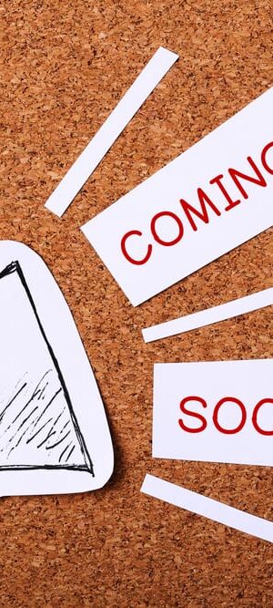 coming soon on corkboard