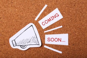 coming soon on corkboard