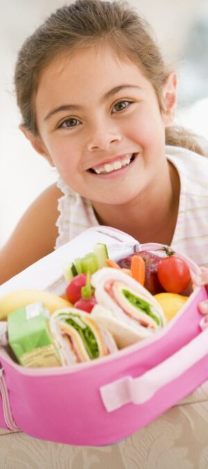 cute girl with lunchbox