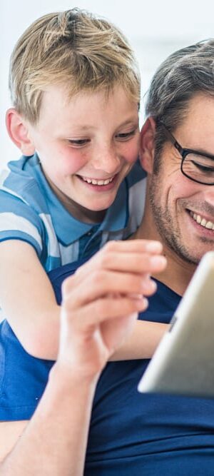 dad and boy with tablet