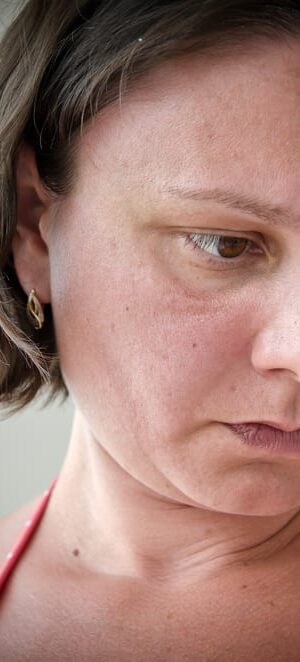 depressed woman looking to side