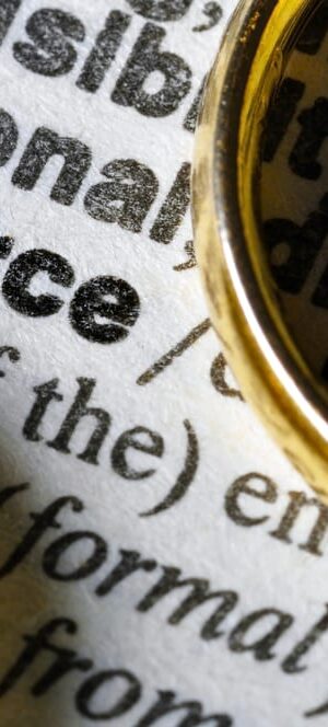 divorce word with wedding rings