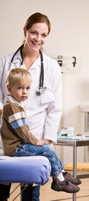doctor and boy in exam room